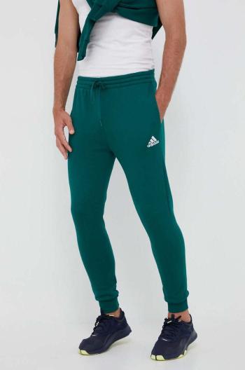 Tepláky adidas zelená farba, jednofarebné