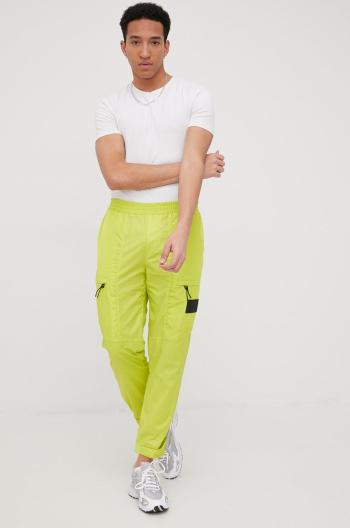 Tepláky Calvin Klein Jeans pánske, zelená farba,