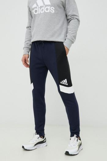 Tepláky adidas pánske, tmavomodrá farba, vzorované