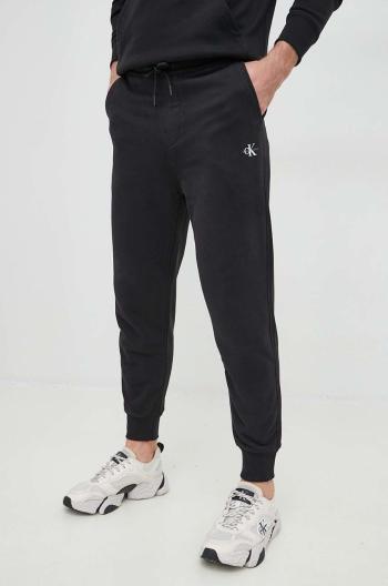 Bavlnené tepláky Calvin Klein Jeans pánske, čierna farba, jednofarebné