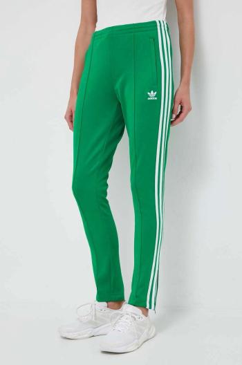 Tepláky adidas Originals zelená farba, s nášivkou