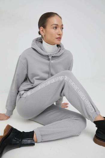 Tepláky Calvin Klein Jeans dámske, šedá farba, s potlačou