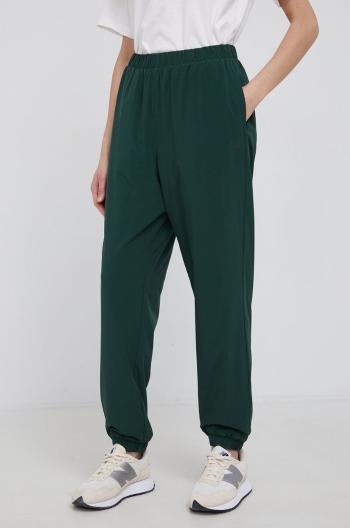 Obojstranné nohavice GAP dámske, zelená farba, jogger, stredne vysoký pás