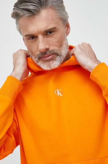 Bavlnená mikina Calvin Klein Jeans pánska, oranžová farba, s kapucňou, s potlačou