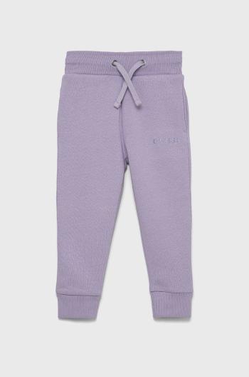 Detské nohavice Guess fialová farba, melanžové