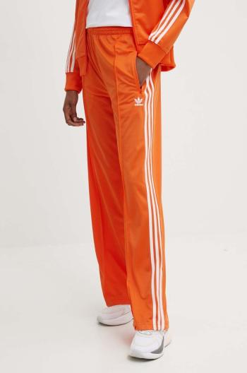 Tepláky adidas Originals oranžová farba, s nášivkou, IP0640