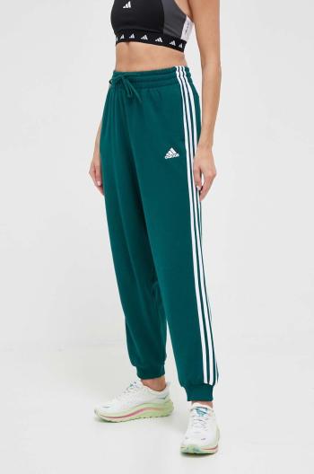 Bavlnené tepláky adidas zelená farba, s nášivkou