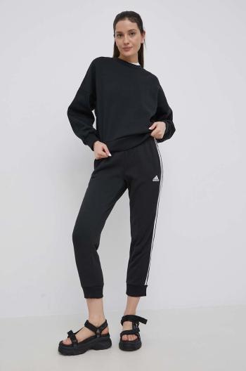 Nohavice adidas HD4309 dámske, čierna farba, s nášivkou