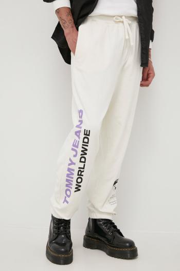 Bavlnené nohavice Tommy Jeans pánske, béžová farba, s potlačou