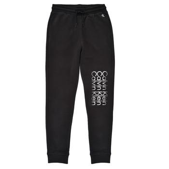 Calvin Klein Jeans  Tepláky/Vrchné oblečenie INSTITUTIONAL CUT OFF LOGO SWEATPANTS  Čierna