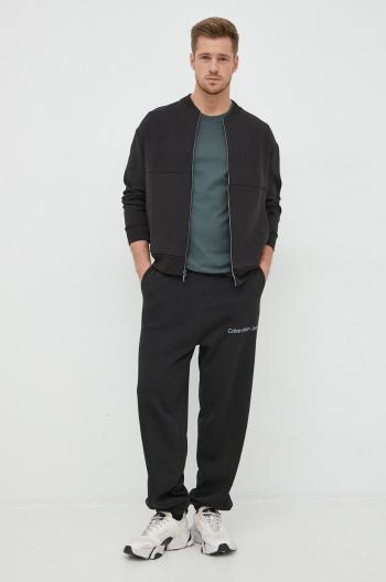 Tepláky Calvin Klein Jeans pánske, čierna farba, s potlačou