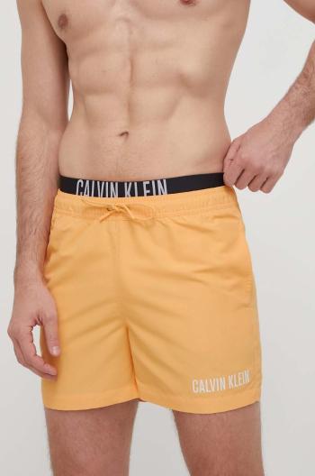 Plavkové šortky Calvin Klein oranžová farba, KM0KM00992