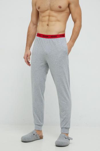 Pyžamové nohavice HUGO pánske, šedá farba, jednofarebná