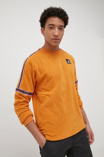 Mikina New Balance MT13513MOE pánska, oranžová farba, s nášivkou