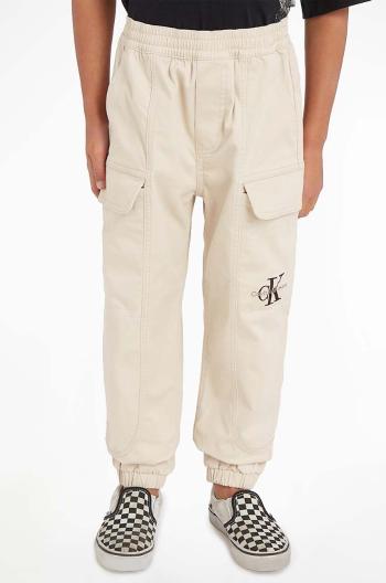 Detské nohavice Calvin Klein Jeans béžová farba, jednofarebné