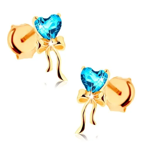 Zlaté náušnice 375 - lesklá mašlička, modré topásové srdiečko