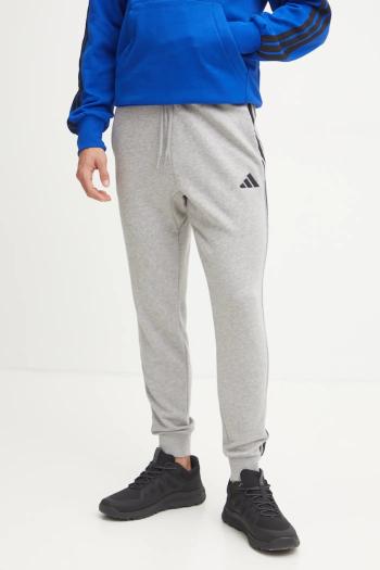 Tepláky adidas Essentials šedá farba, melanžové, JE6346