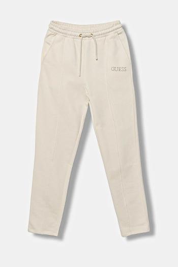 Detské bavlnené tepláky Guess béžová farba, s nášivkou, J5YQ17 KAV34