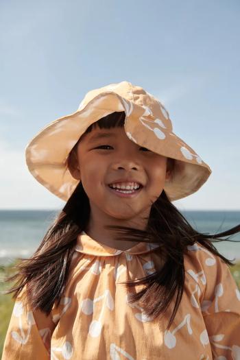 Detský obojstranný klobúk Liewood Amelia Reversible Sun Hat oranžová farba
