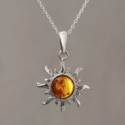 Strieborný náhrdelník s jantárovým príveskom slnko