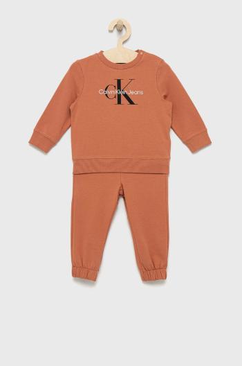 Detská tepláková súprava Calvin Klein Jeans oranžová farba
