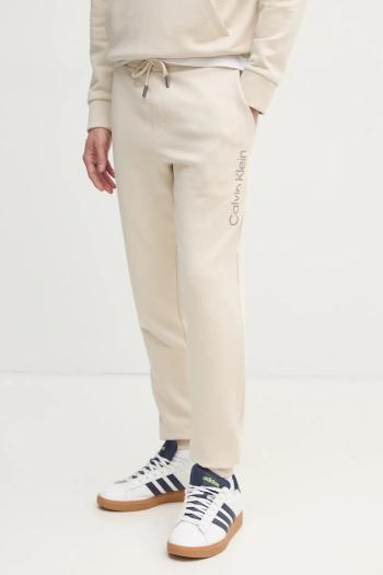 Bavlnené tepláky Calvin Klein béžová farba, s nášivkou, K10K114254