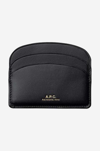 Kožené puzdro na karty A.P.C. Porte-cartes Demi-lune PXAWV-F63270 BLACK čierna farba