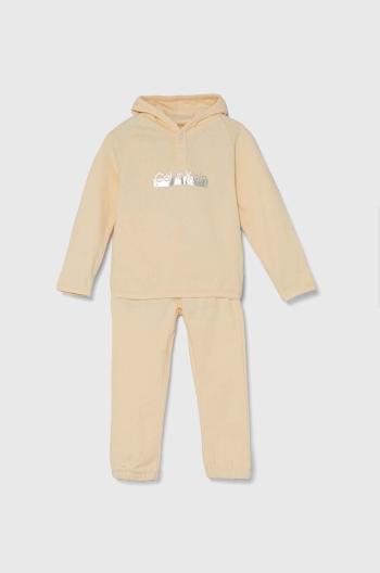 Detská bavlnená tepláková súprava Calvin Klein Jeans oranžová farba
