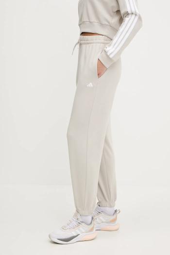 Tepláky adidas Essentials béžová farba, jednofarebné, JC8305