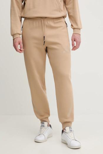 Tepláky adidas x Z.N.E béžová farba, s potlačou, JW4725