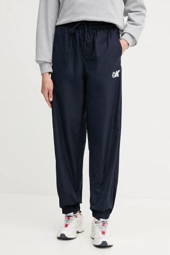 Tepláky Calvin Klein Jeans tmavomodrá farba, s potlačou, LV047C627G