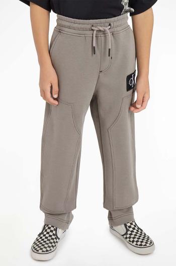 Detské tepláky Calvin Klein Jeans šedá farba, jednofarebné