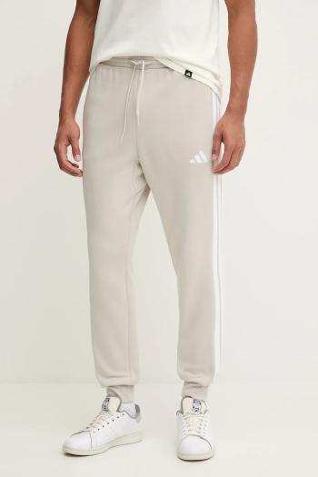 Tepláky adidas Essentials béžová farba, s nášivkou, JE6317