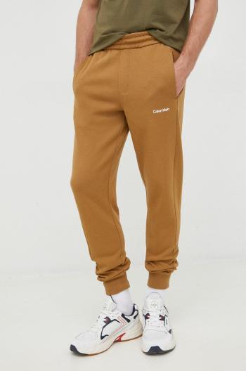 Tepláky Calvin Klein pánske,hnedá farba,jednofarebné,K10K109940