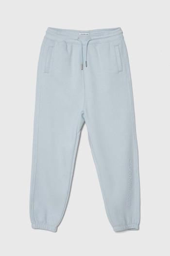 Detské tepláky Calvin Klein Jeans s nášivkou