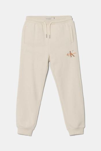 Detské bavlnené tepláky Calvin Klein Jeans béžová farba, jednofarebné, IU0IU00285
