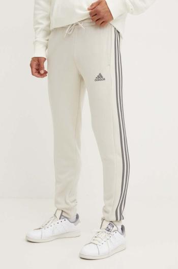 Tepláky adidas Essentials béžová farba, s nášivkou, JG5952