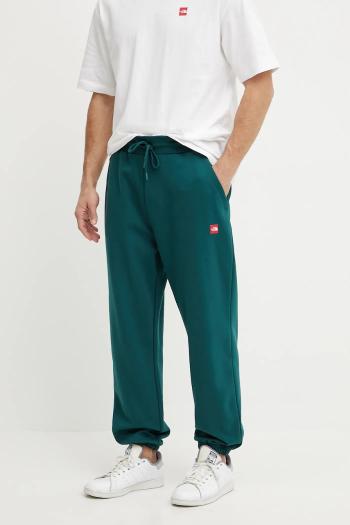 Bavlnené tepláky The North Face Axys pánske, zelená farba, jednofarebné, NF0A8C1U6GI1
