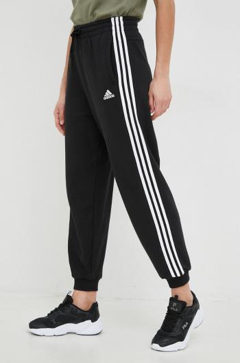 Bavlnené tepláky adidas dámske, čierna farba, s nášivkou