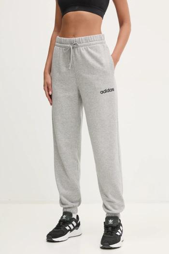 Tepláky adidas Essentials Linear dámske, šedá farba, jednofarebné, JC5953