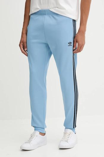 Tepláky adidas Originals SST modrá farba, s nášivkou, JY1286