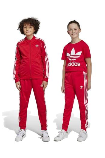 Detské tepláky adidas Originals červená farba, vzorované