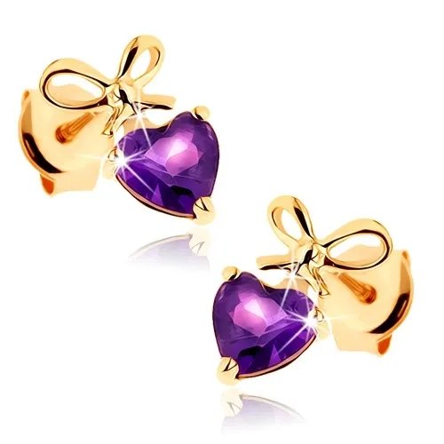 Zlaté náušnice 9K s fialovým srdcom z ametystu a viazanou mašľou
