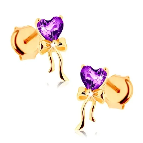 Zlaté náušnice 9K s fialovým srdcom z ametystu a lesklou mašľou