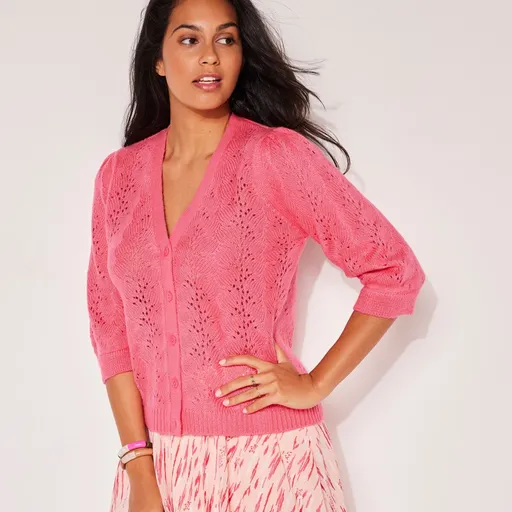 Ažúrový sveter s výstrihom doV