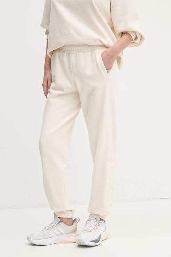 Tepláky Dkny béžová farba, s nášivkou, DP5P3585