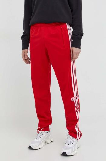 Tepláky adidas Originals červená farba, s nášivkou,  IM8221