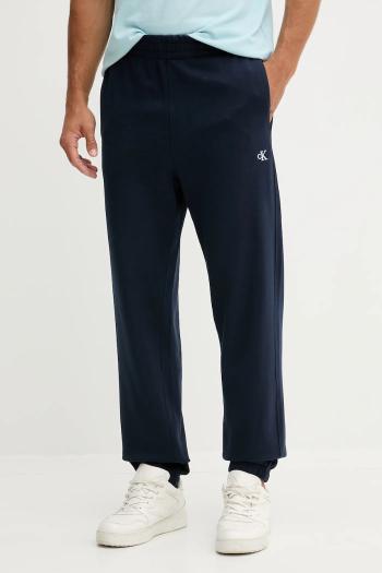 Bavlnené tepláky Calvin Klein Jeans tmavomodrá farba, jednofarebné, LV04RD241G