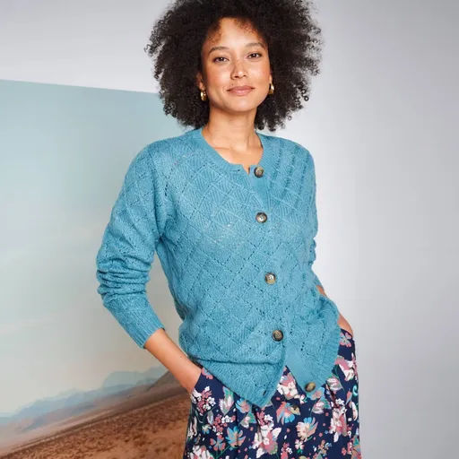 Sveter s
		azúrovým vzorom