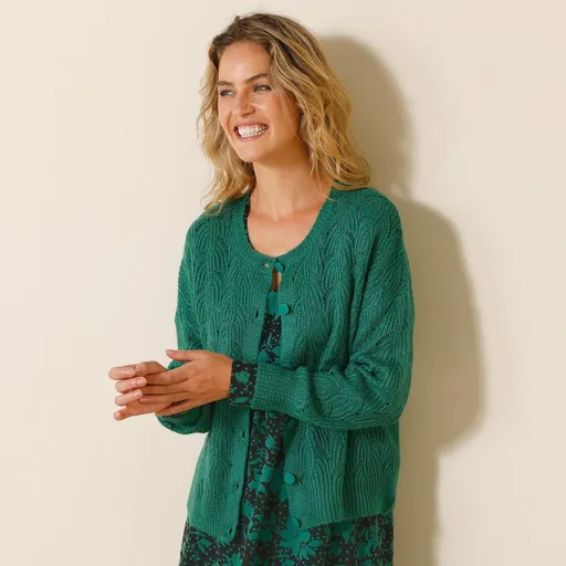 Ažúrový sveter na gombíky s okrúhlym výstrihom